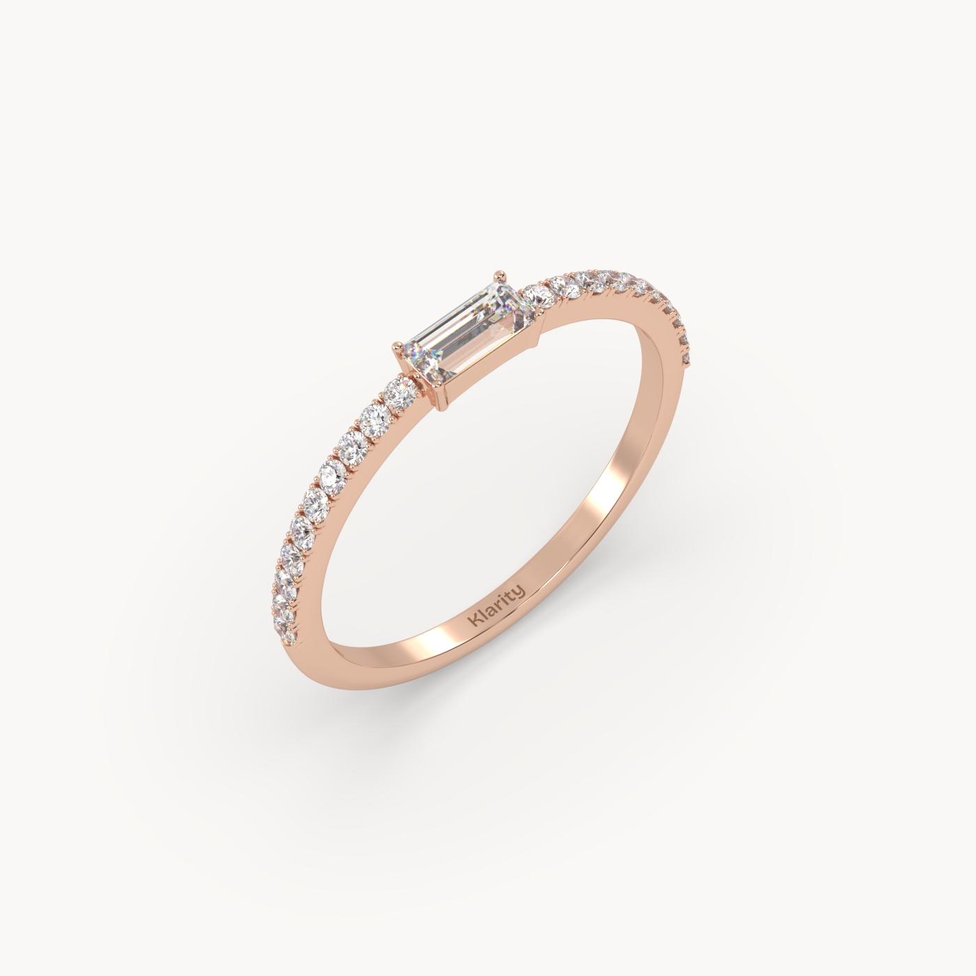 18k rose gold  baguette solitaire diamond ring with pavé-set band