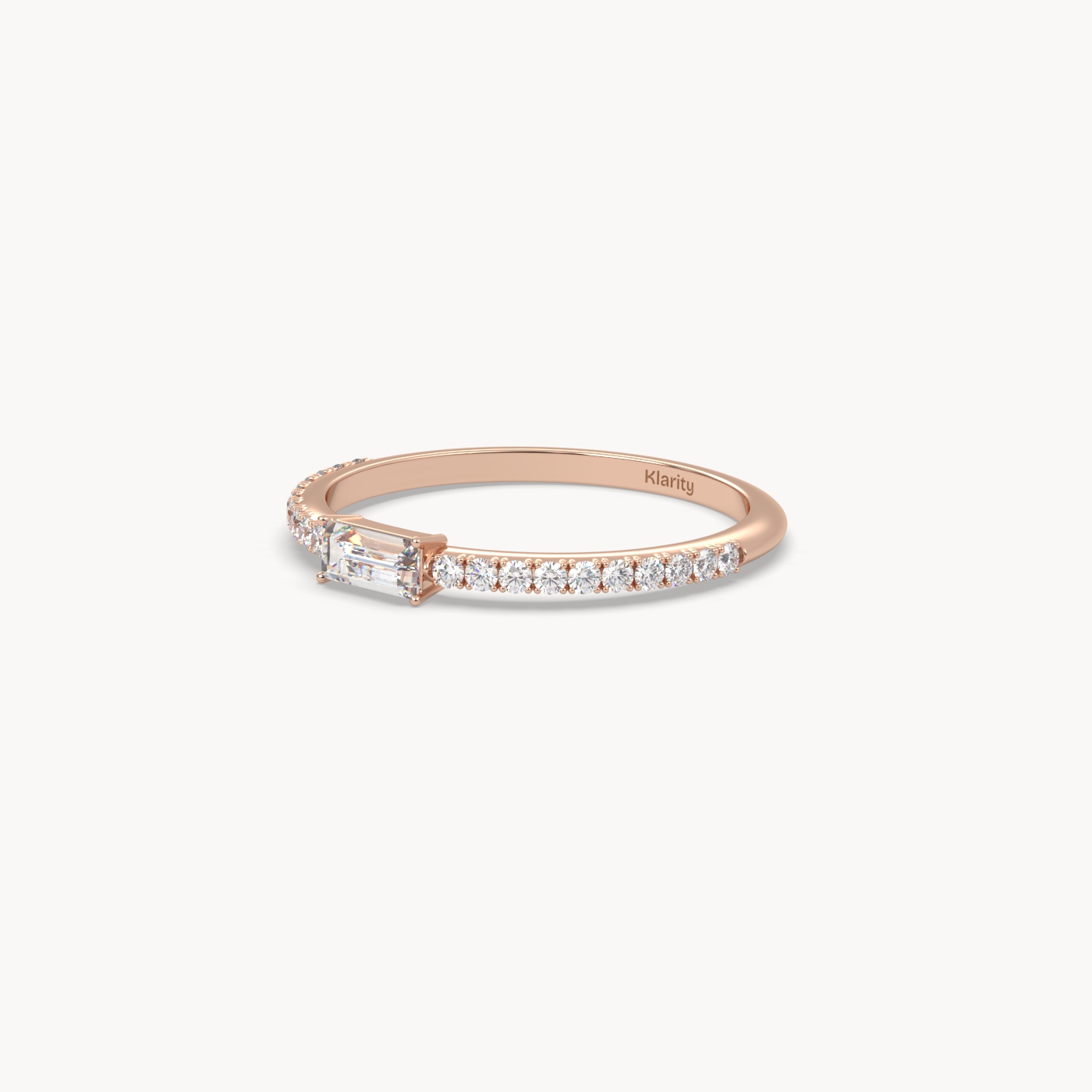 18k rose gold  baguette solitaire diamond ring with pavé-set band